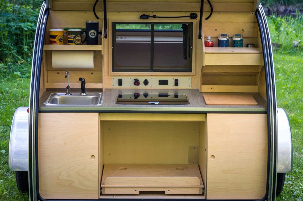 Laminated Galley Counter With Sliding Doors Below